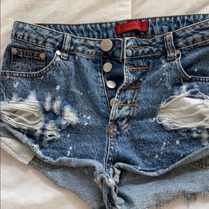 Cut off, button front denim shorts